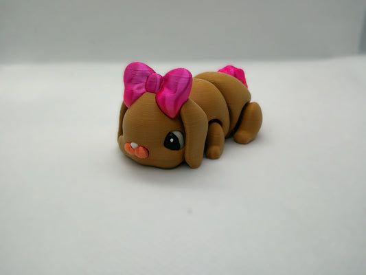 3D-Printed Bunny Figurine with Pink Bows – Articulated Toy