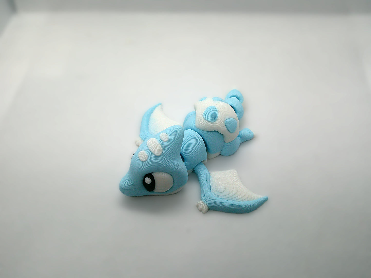 blue dinosaur hatching 3d print